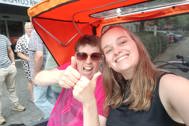 Thumbnail: Riksha zorgfiets cliënt en medewerker - steun ons 2025